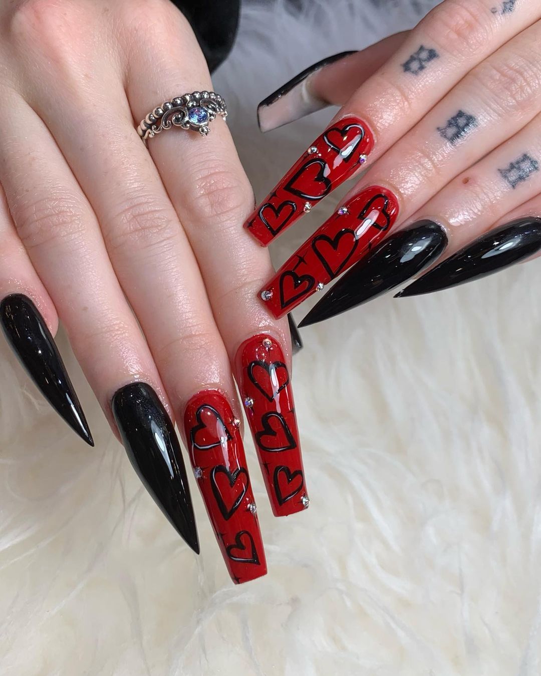 Black and Red Vampire Style nails! Perfect for adding a touch of mystery and elegance to your look